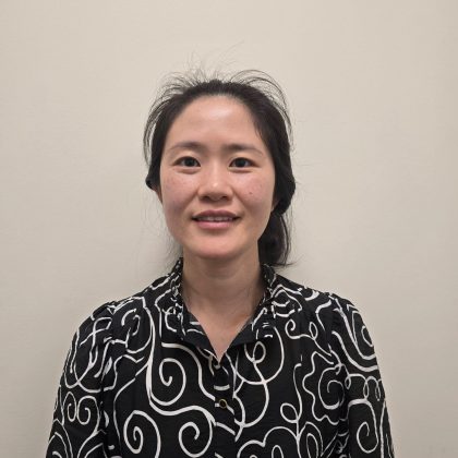 Dr Thinzar Win smiles at the camera